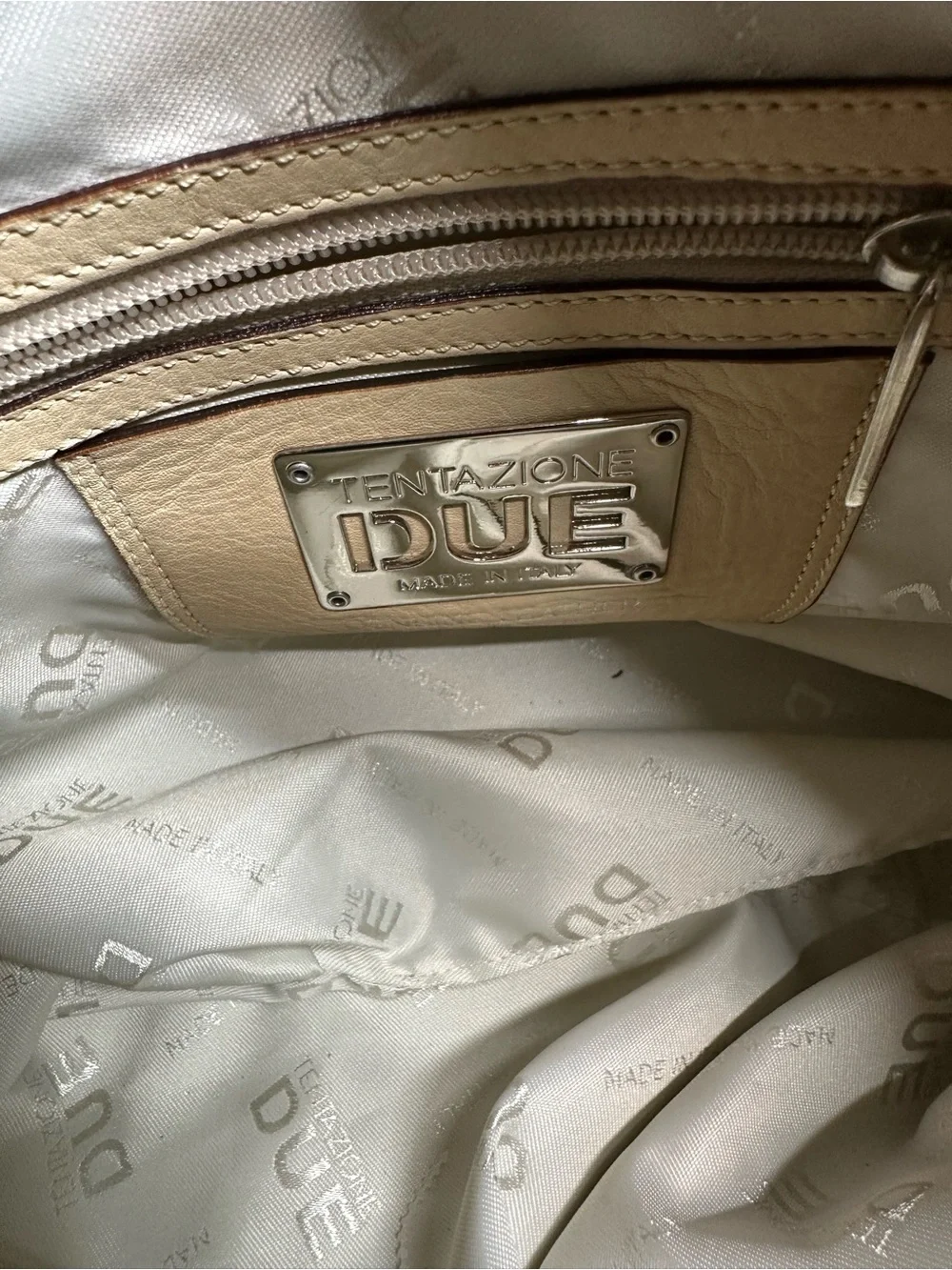 Cream Leather Shoulder Hobo Bag with Embossed Crest